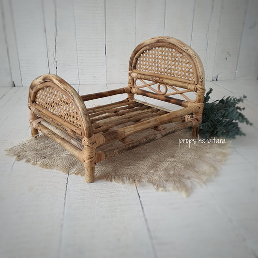 Woven wicker bed